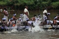 Oarsmen wearing traditional kerala dress participate in the Aranmula boat race