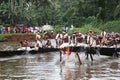 Oarsmen wearing traditional kerala dress participate in the Aranmula boat race