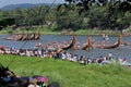 Oarsmen wearing traditional kerala dress row thier snake boat in the Aranmula boat race