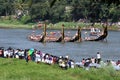 Oarsmen wearing traditional kerala dress row thier snake boat in the Aranmula boat race