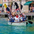 Oarsmen welcome viewers in Venice Vogalonga.