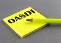 OASDI text written on a sticky on grey background Royalty Free Stock Photo
