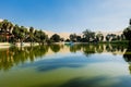 Oasis of Huacachina near Ica city in Peru. Lake and trees inside the dunes Royalty Free Stock Photo