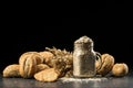 Oat bunch, baked white bread, cookies and flakes in flavouring jar Royalty Free Stock Photo