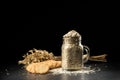 Oat bunch, cookies and flakes in flavouring jar Royalty Free Stock Photo