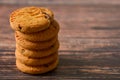 Oat and chocolate chip cookies on rustic wooden table background, copy space Royalty Free Stock Photo