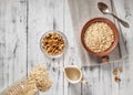 Oat flakes in brown clay bowl ready to cook Royalty Free Stock Photo