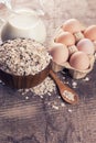 Oat flakes, eggs, milk Royalty Free Stock Photo