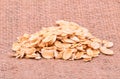 Oat flakes on sackcloth Royalty Free Stock Photo