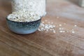 Oat flakes on worn wood table