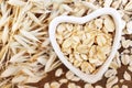 Oat groat in heart-shaped bowl