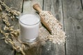 Oat milk alternative on rustic wood background Royalty Free Stock Photo