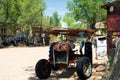 OATMAN ARIZONA, USA - AUGUST 7. 2009: Old rusty isolated tractor on abandoned farm in countryside