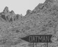 Oatman Sign, a Wild West Ghost Town in black and white. On U.S. Route 66 in the Black Mountain Range of the Sonoran Desert, Arizon