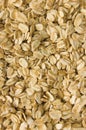 Oatmeal background texture, rolled raw oats, detailed vertical textured macro closeup pattern Royalty Free Stock Photo