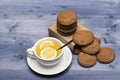 Oatmeal biscuits as pastry for cup of tea with lemon Royalty Free Stock Photo