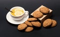 Oatmeal biscuits as pastry for cup of tea with lemon Royalty Free Stock Photo