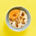 Oatmeal with caramelized pear and walnut