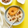 Oatmeal with caramelized pear and walnut Royalty Free Stock Photo