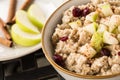 Oatmeal Cereal With Apples And Cranberries And Cinnamon Sticks Royalty Free Stock Photo