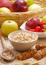 Oatmeal cereal bowl and ears of corns and fruit ingredients