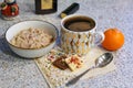 Oatmeal And Coffee. Traditional Breakfast. Breakfast From Oatmeal With And Cup Of Black Coffee On A Table.