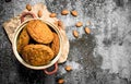 Oatmeal cookies in a bowl with nuts. Royalty Free Stock Photo