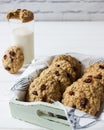 Oatmeal cookies raisin milk.