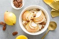 Oatmeal with cottage cheese, pecan nuts and pear for breakfast Royalty Free Stock Photo