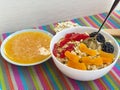 Oatmeal with dried fruit (apricots, dogwood, prunes), with honey and milk Royalty Free Stock Photo