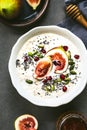 Oatmeal with fresh Fig,Pomegranate and Chia seed topping