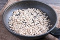 Oatmeal in a frying pan. Healthy breakfast, healthy eating, vegan food concept Royalty Free Stock Photo