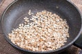 Oatmeal in a frying pan. Healthy breakfast, healthy eating, vegan food concept Royalty Free Stock Photo