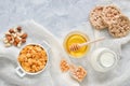 Cornflakes with honey, milk, bread and nuts with space for text. Healthy diet. Mortgage on an apartment Royalty Free Stock Photo