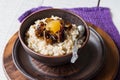 Oatmeal with milk and honey and dried fruit, healthy breakfast Royalty Free Stock Photo