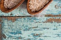 Oatmeal or oat flakes on dark wooden table Royalty Free Stock Photo