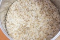 Oats and oatmeal in a container close up shot macro. Royalty Free Stock Photo