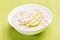 Oatmeal porridge with apple slices and cinnamon Royalty Free Stock Photo