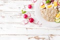 Oatmeal porridge with boiled egg and vegetable salad with fresh radish, cucumber and lettuce. Healthy dietary breakfast Royalty Free Stock Photo