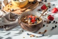 Oatmeal porridge in coconut bowl with wooden spoon. Porridge oats with strawberry, pistachios, blueberry, almond and