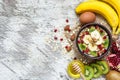 Oatmeal porridge with fruits, nuts and honey. healthy breakfast Royalty Free Stock Photo