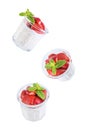 Oatmeal porridge with milk and fresh strawberries in a glass on a white isolated background Royalty Free Stock Photo