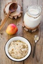 Oatmeal porridge with raspberry and milk, healthy breakfast Royalty Free Stock Photo