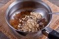 Oatmeal porridge in a saucepan Royalty Free Stock Photo