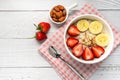 Oatmeal Porridge with Strawberries, Almonds and Banana in white bowl. Healthy Breakfast with Oatmeal and Fresh Organic Strawberry Royalty Free Stock Photo