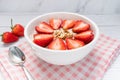 Oatmeal Porridge with Strawberries, Almonds in white bowl. Healthy Breakfast with Oatmeal and Fresh Organic Strawberry. vegan food Royalty Free Stock Photo