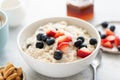 Oatmeal porridge with strawberries and blueberries Royalty Free Stock Photo