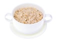 Oatmeal porridge in a white bowl, isolate