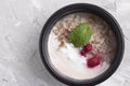 Oatmeal with raspberries and curd in eco food container