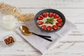 Oatmeal with strawberries and almond, healthy food, concept dietary food